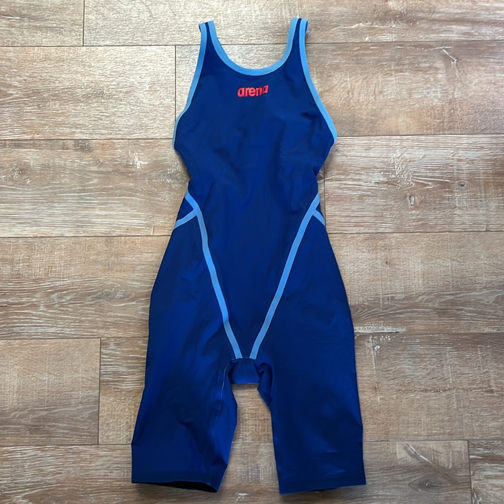 Arena. Open Back. Size 24. First like a 26